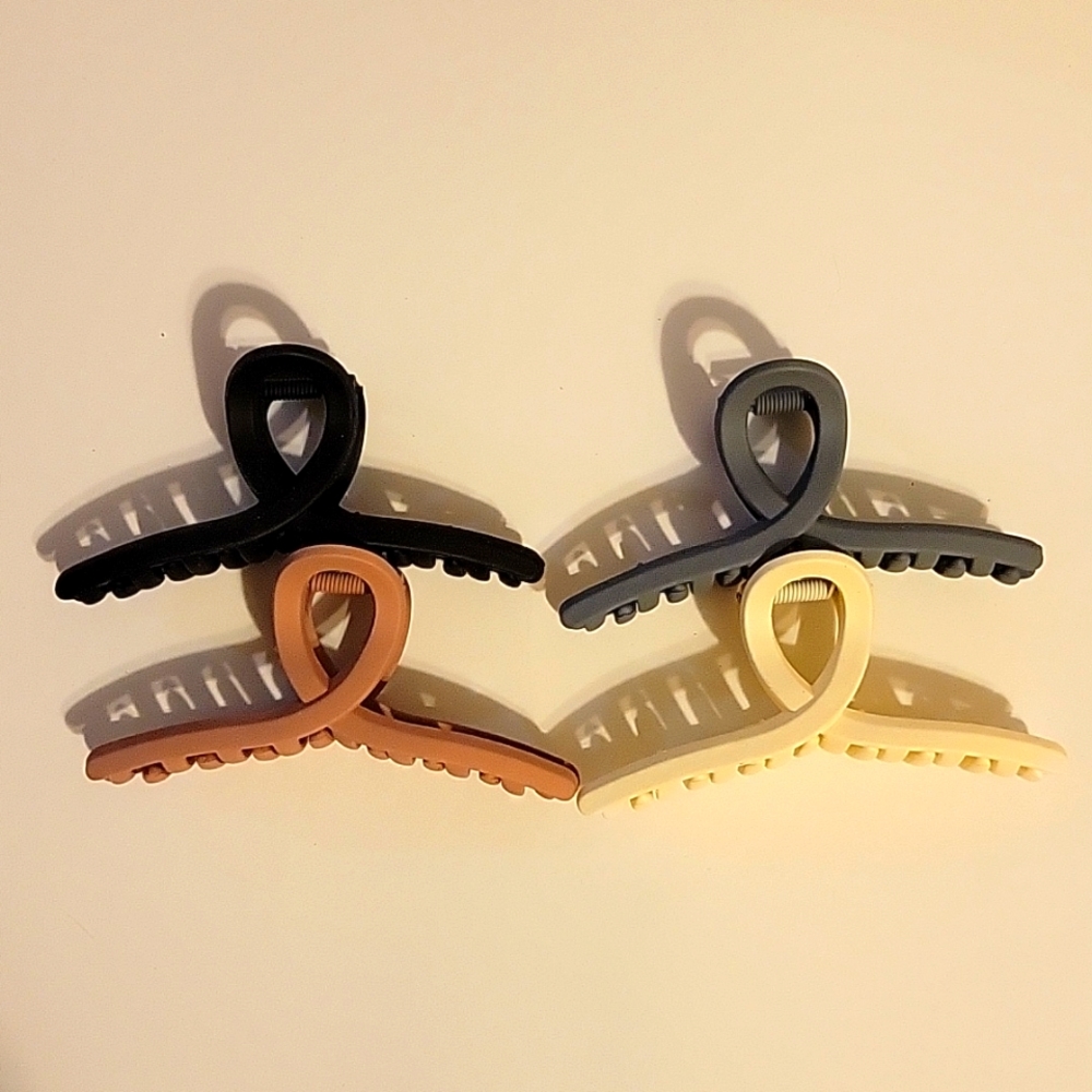 4- Hair clips-Never used. Black. Gray. Ivory. Dark Pink
